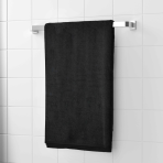 Badetuch „Obsidian Softness“. Badetücher, 70x140 cm. Elegantes schwarzes handtuch, das ihrem badezimmer modernen stil und luxus verleiht.